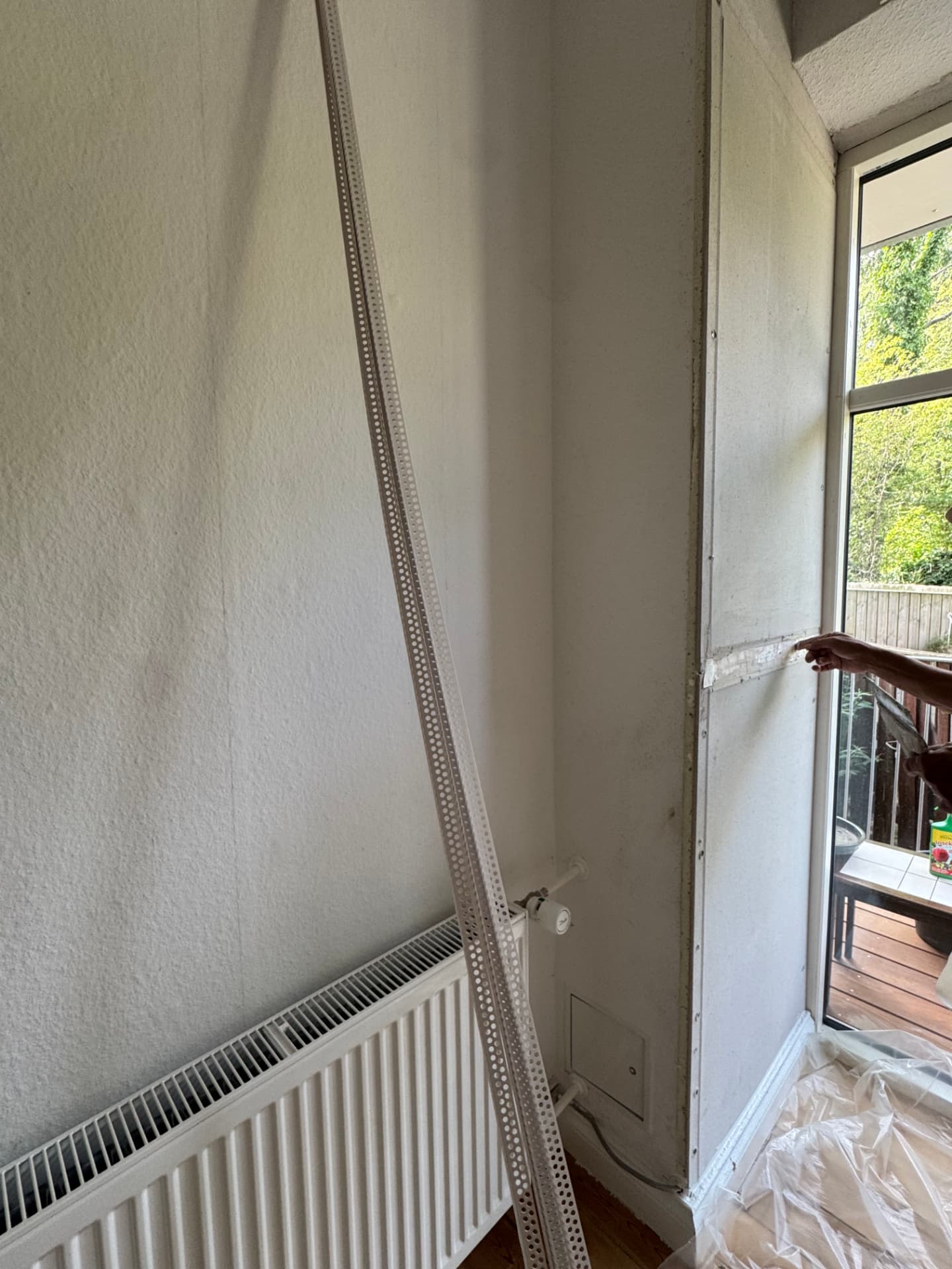 Hjørneskinne og afdækning under arbejdet